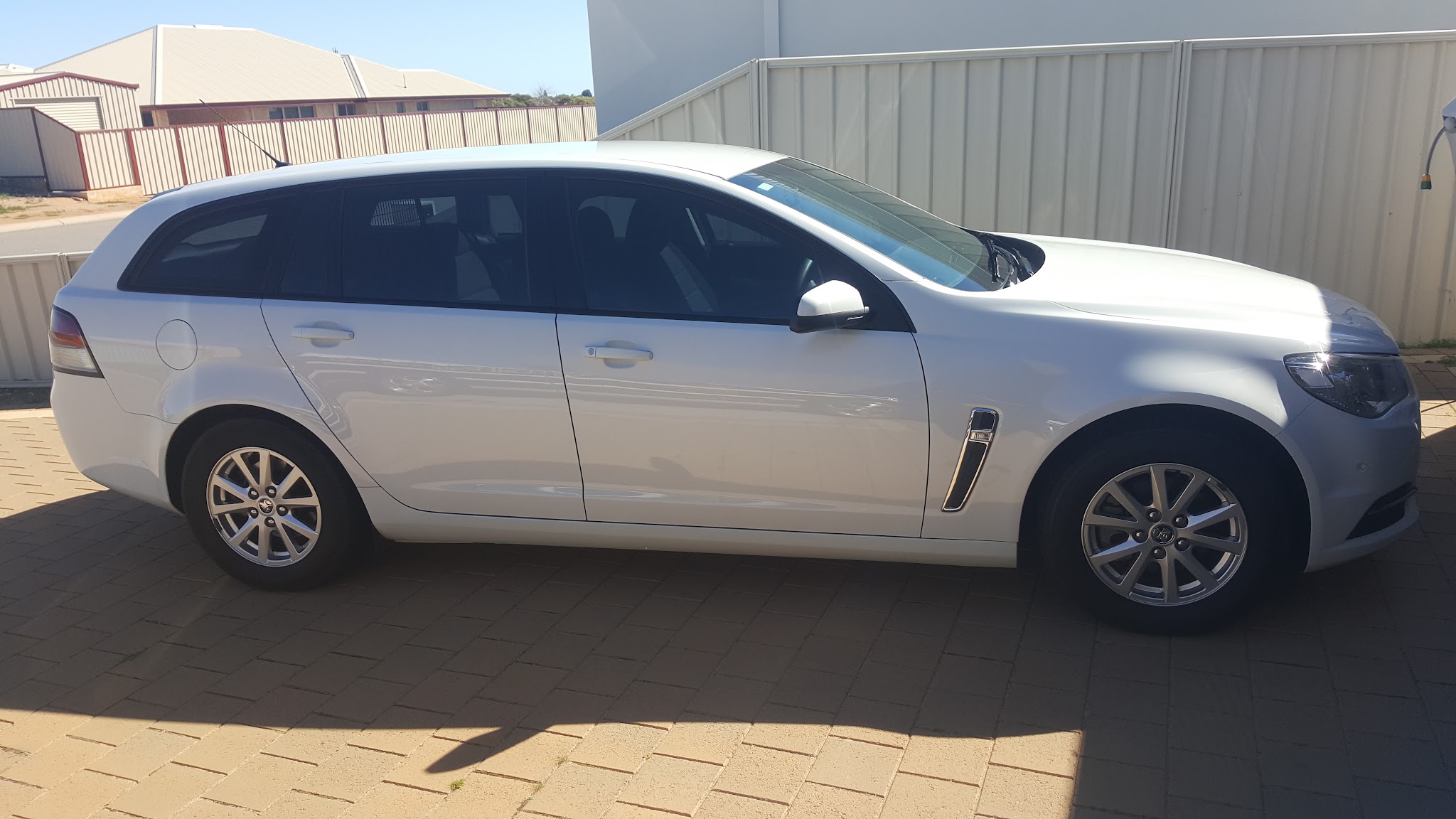 A white Commodore Sportwagon after a service